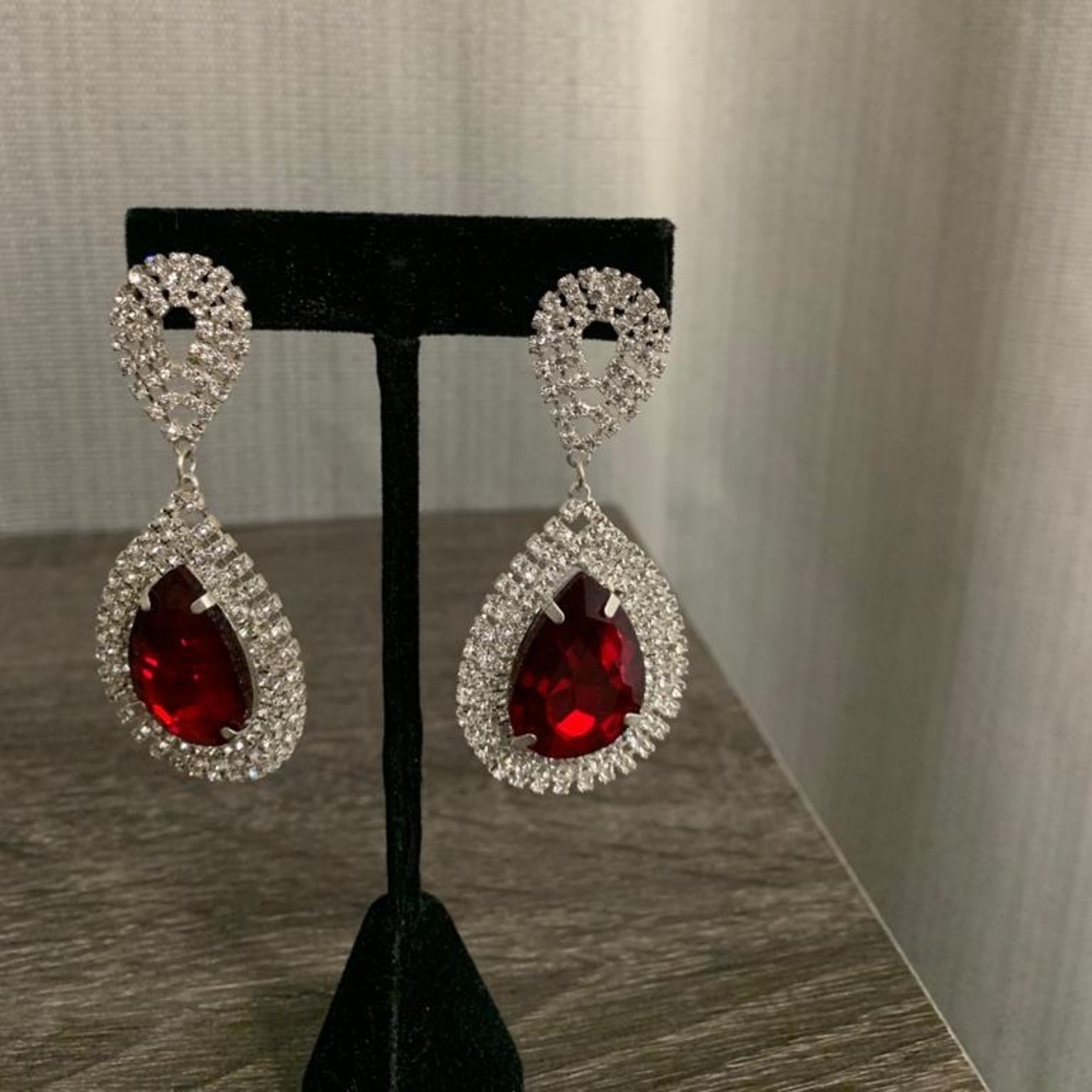 Silver earrings with red stone